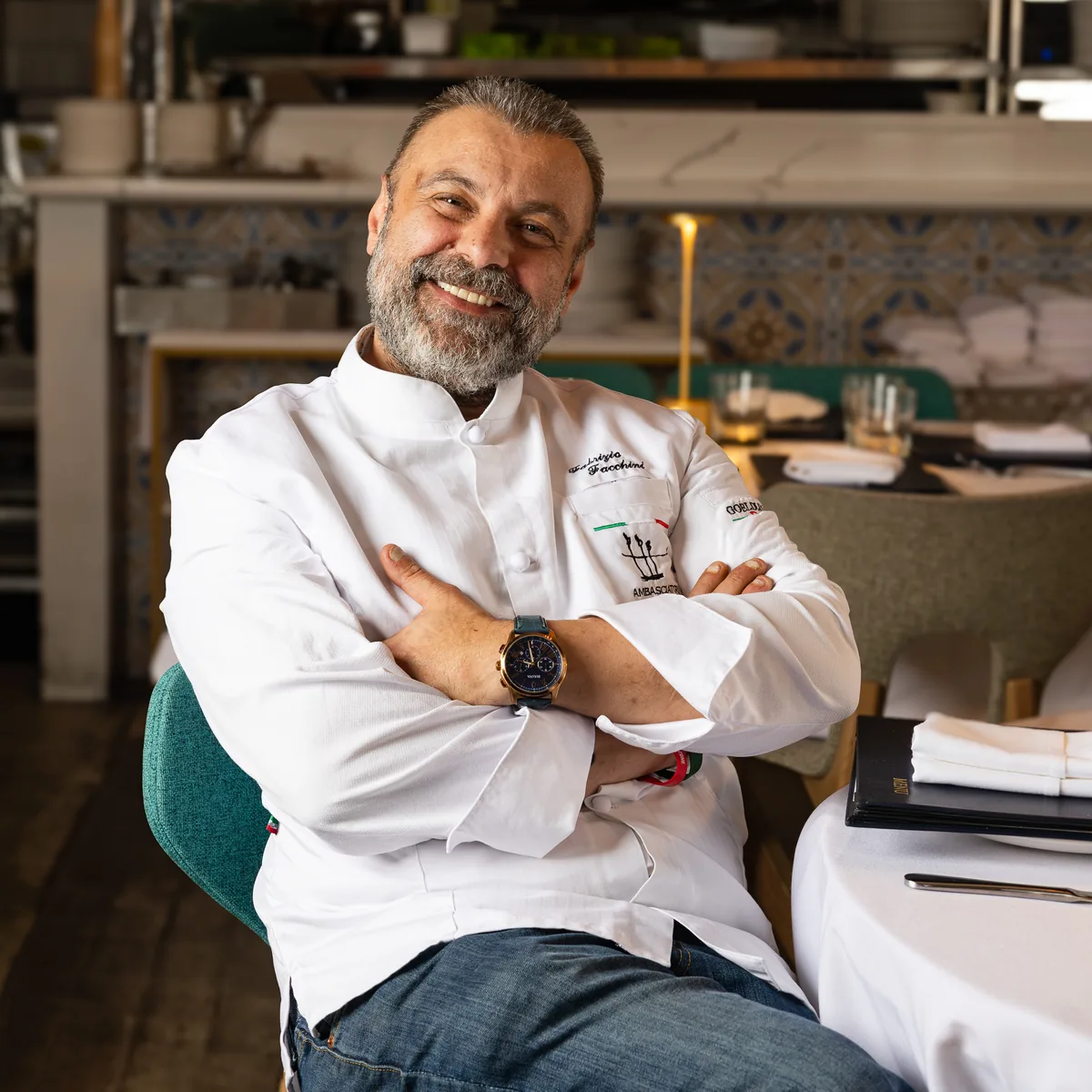 Chef Fabrizio Facchini, arms folded, in his whites