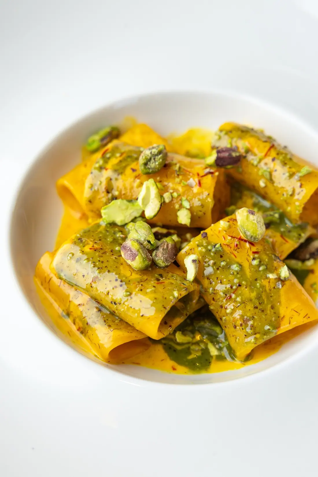 Paccheri in saffron cream with pistachio