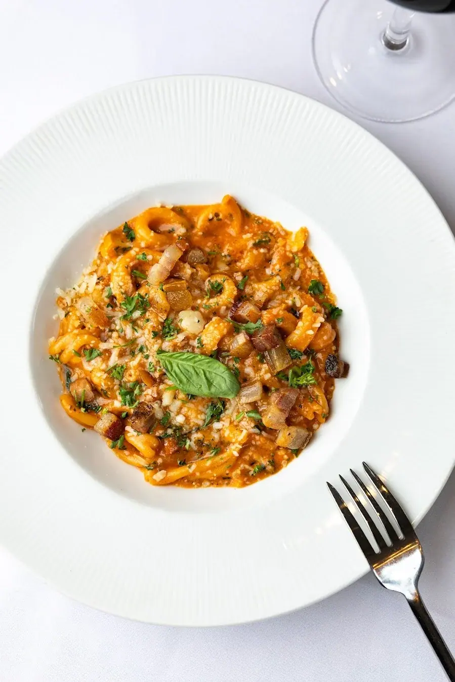 Strozzapreti with smoked pancetta and provola